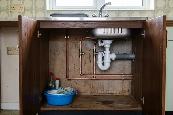 Illustration of new plumbing pipework and taps